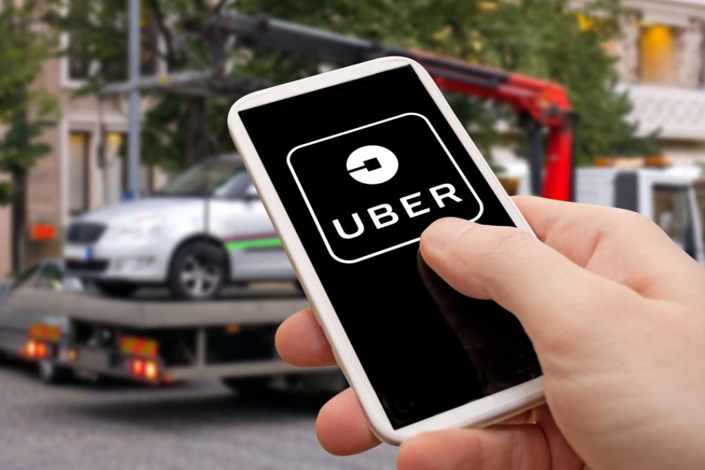 Uber Accident Person Holding Phone In A Backseat