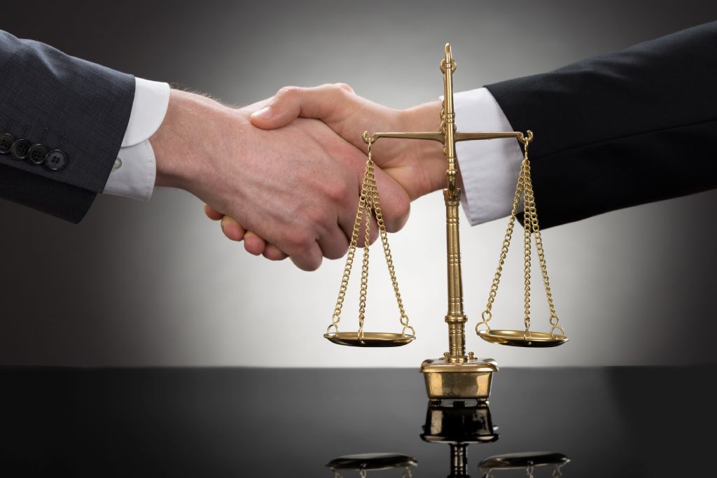 Lawyer shaking hands Lawyer shaking hands